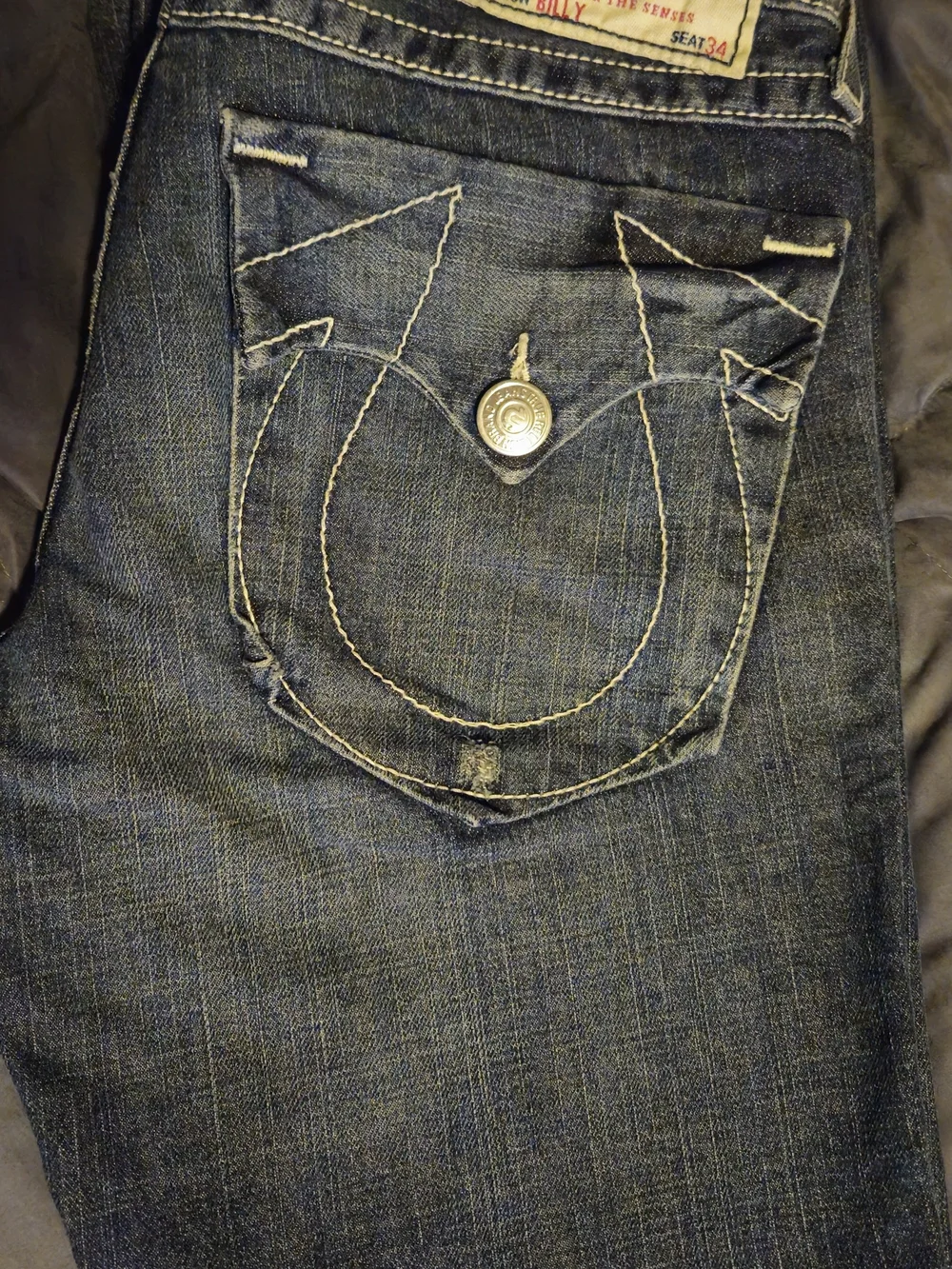 True Religion Mens Billy Dark Blue Bootcut Jeans with Signature Pocket Stitching